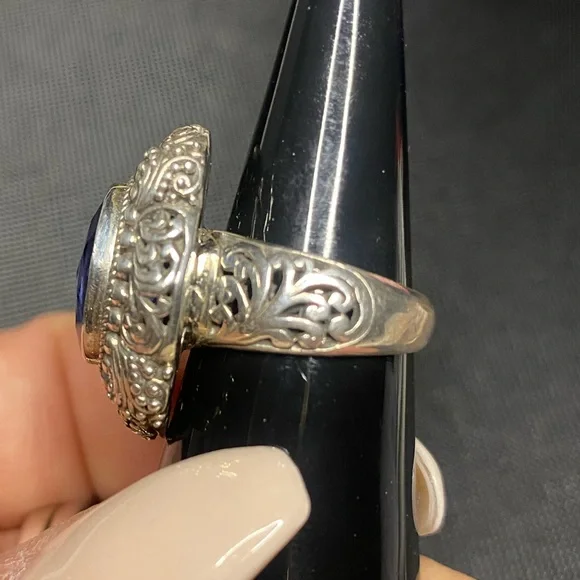 Blue Topaz and Sterling silver .925 ring. 
Size 6
Gorgeous detail. - Picture 7 of 9